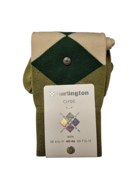 A pair of folded knit socks with a green and beige argyle pattern, featuring a metal snap button and a white paper tag from Burlington reading 'Clyde' for men.